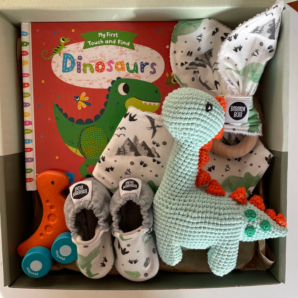 Little Dino Baby Hamper- Little Wonders - Personalised gift boxes - made in Melbourne, Dino toys - Dinosaurs - Baby Boy gift hamper - Handcrafted new baby hamper - little people big dreams - best baby gifts - eco-friendly - soft and cuddly - great gift idea - baby slippers - baby blanket - little hands - teddy- best hampers Australia - colourful - roller toys - Kids book - Best baby boy gift pack - gift box - support local 