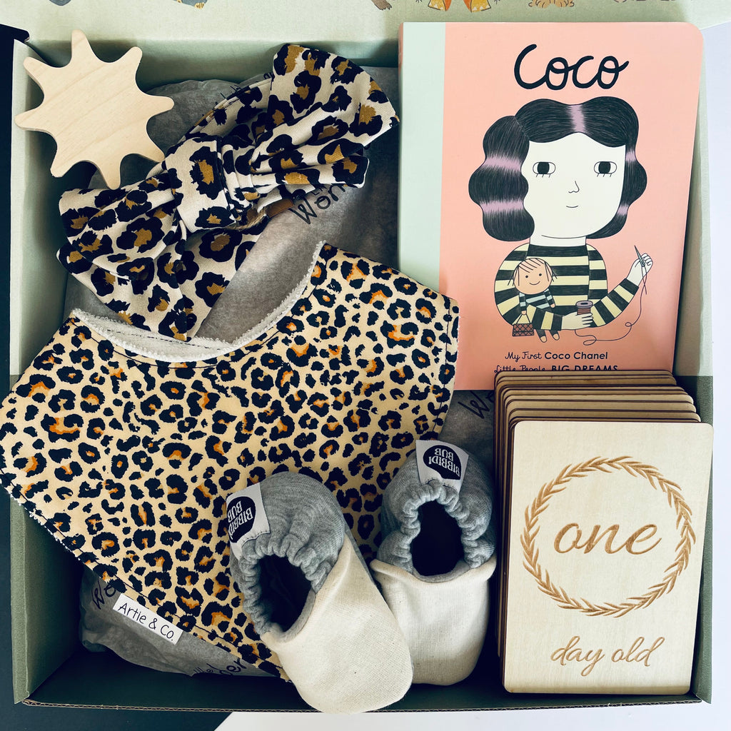 Fashionista baby hamper - leopard bib and top knot - leopard print baby - leopard print in style - stylish Bub - new born baby hamper -stylish baby hamper - handmade products - little wonders - Australia - hand-crafted in Melbourne - support local - coco channel book - little people big dreams -little hands - movement - reading - baby reading - super fun - lots of laughs - super soft - great gift idea - best hamper idea - stays soft after wash - on-the-go-hugs - little wonders Australia 